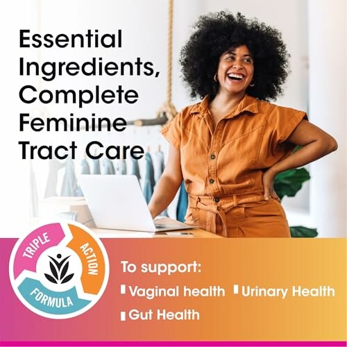 Woman smiling next to laptop with feminine health care product information.