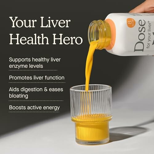 Liver health supplement being poured into a glass.